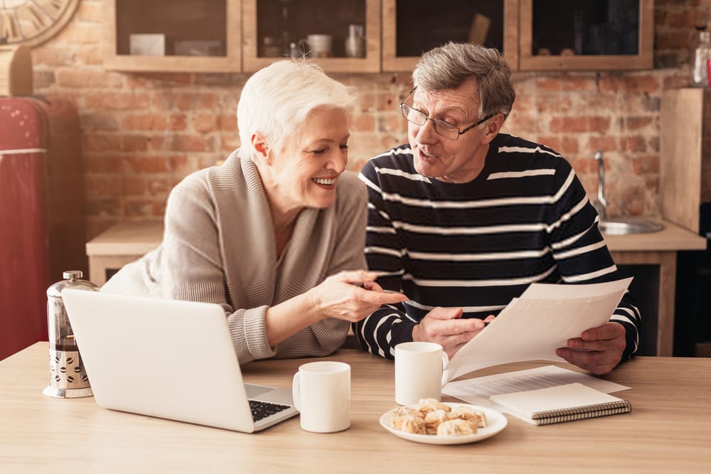 Elder Couple Discussing Home Economics